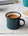 dark green enamel mug