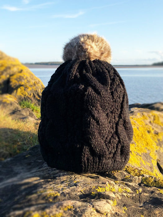 black bobble hat